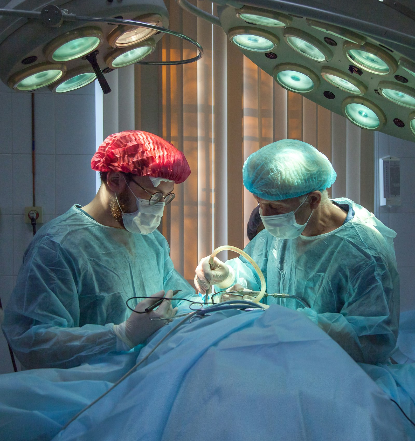 Surgical team in an operating theatre representing treatment of injury types